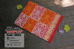 KK112 Kain Batik Motif Gorga Warna Oranye Putih Merah